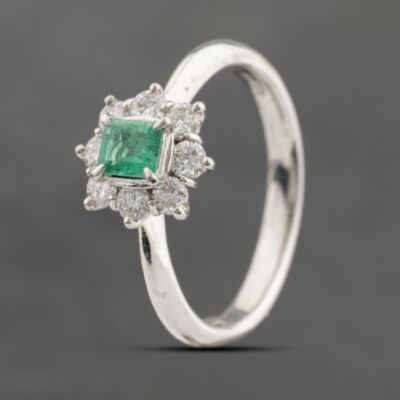 Pre-Owned Platinum Emerald & 0.33ct Brilliant Cut Diamond Oval Cluster Ring 43371062