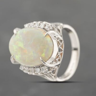 Pre-Owned Platinum 5.15ct Opal & 0.23ct Diamond Oval Dress Ring 43381032