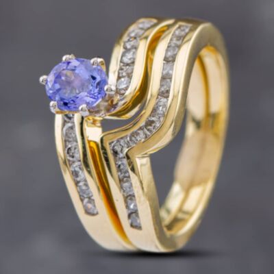 Pre-Owned 14ct Yellow Gold 0.67ct Tanzanite & 0.60ct Brilliant Cut Diamond Twist Bridal Set Ring 43411013