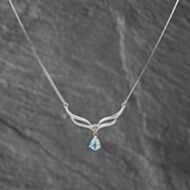 Pre-Owned 9ct White Gold Blue Topaz & 0.05ct Diamond Pendant & 16 Inch Curb Chain 41142628