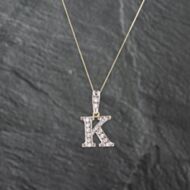 Pre-Owned 9ct Yellow Gold Cubic Zirconia K Shape Pendant & 18 Inch Curb Chain 41142692