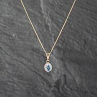 Pre-Owned 9ct Two Colour Gold Blue Topaz & 0.04ct Diamond Oval Cluster Pendant & 18 Inch Curb Chain 41142863