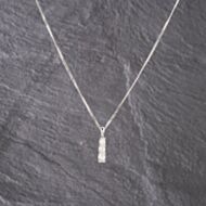 Pre-Owned 9ct White Gold 0.42ct Diamond Three Stone Graduating Tension Set Pendant & 18 Inch Curb Chain 41143162