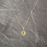 Pre-Owned 9ct Yellow Gold Peridot & Diamond Oval Pendant & 18 Inch Curb Chain 41143215