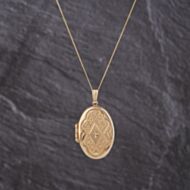 Pre-Owned 9ct Yellow Gold 0.01ct Brilliant Cut Diamond Engraved Oval Locket Pendant & 18 Inch Curb Chain 41143255
