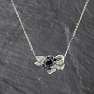 Pre-Owned 14ct White Gold Sapphire & 0.82ct Brilliant Cut Diamond Fancy Bow Pendant & 16 Inch Belcher Chain 41143353