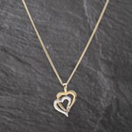 Pre-Owned 9ct Two Colour Gold Double Heart Pendant & 19 Inch Curb Chain 41143590