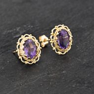 Pre-Owned Yellow Gold 10mm Amethyst Oval Stud Earrings 41173299