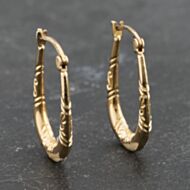 Pre-Owned Yellow Gold 69mm Oval Patterned Creole Earrings 41173332