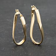 Pre-Owned Yellow Gold 34mm Oval Crossover Twist Creole Earrings 41173348