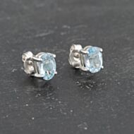 Pre-Owned 9ct White Gold 7mm Blue Topaz Oval Stud Earrings 41173388