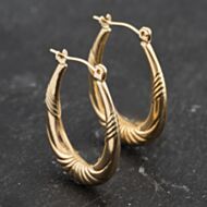 Pre-Owned Yellow Gold 24mm Patterned Oval Creole Earrings 41173414