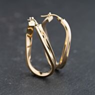 Pre-Owned 9ct Yellow Gold 33mm Twisted Oval Hoop Earrings 41173773