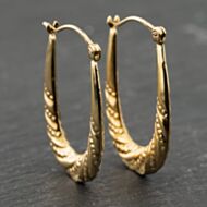 Pre-Owned Yellow Gold 31mm Oval Patterned Creole Earrings 41173928