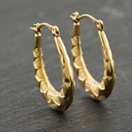 Pre-Owned Yellow Gold 25.5mm Oval Patterned Creole Earrings 41173932