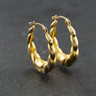 Pre-Owned Yellow Gold Oval Embossed Creole Earrings 41174205