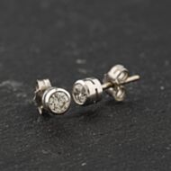 Pre-Owned 18ct White Gold Diamond Rubover Single Stone Stud Earrings 41174368
