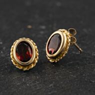 Pre-Owned Yellow Gold 9mm Garnet Oval Stud Earrings 41174559