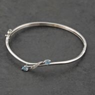 Pre-Owned 9ct White Gold Blue Topaz & Diamond Crossover Hinged Bangle 41211354
