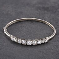 Pre-Owned Silver Graduating Cubic Zirconia Hinged Bangle 41211375