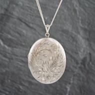 Pre-Owned Silver Oval Foliate Engraved And Diamond Cut Locket Pendant & Curb Chain 41251459