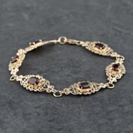 Pre-Owned 9ct Yellow Gold Garnet Set 7.5 Inch Bracelet 41281590
