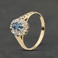 Pre-Owned 9ct Yellow Gold Blue Topaz & Diamond Oval Cluster Ring 41384044