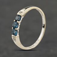 Pre-Owned 9ct White Gold Blue Topaz & 0.02ct Diamond Five Stone Ring 41384045