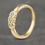 Pre-Owned 18ct Yellow Gold 0.17ct Brilliant Cut Diamond Rub Over Set Three Stone Ring 41482060