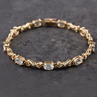 Pre-Owned 9ct Yellow Gold Blue Topaz & 0.08ct Brilliant Cut Diamond Hearts 7.5 Inch Bracelet 43071019
