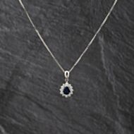Pre-Owned Platinum 0.96ct Sapphire & 0.43ct Brilliant Cut Diamond Pear Shaped Cluster Pendant & 16 Inch Box Chain 43141343