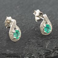 Pre-Owned White Gold 0.30ct Oval Cut Emerald & 0.03ct Diamond Swirl Stud Earrings 43171090