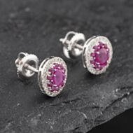 Pre-Owned 14ct White Gold 0.70ct Ruby & 0.25ct Diamond Oval 9mm Stud Earrings 43171229