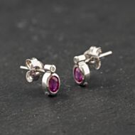 Pre-Owned 9ct White Gold 0.76ct Ruby & 0.01ct Diamond Oval 7.4mm Stud Earrings 43171460