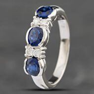 Pre-Owned Platinum 1.60ct Oval Cut Sapphire & 0.15ct Brilliant Cut Diamond Seven Stone Ring 43351039