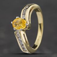 Pre-Owned 9ct Yellow Gold Oval Cut Yellow Sapphire & Brilliant Cut Diamond Cross Over Dress Ring 43361057