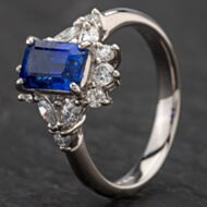 Pre-Owned Platinum Emerald Cut 1.75ct Sapphire & 0.50ct Diamond Cluster Ring 4336129