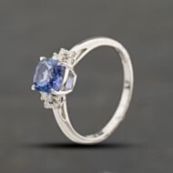 Pre-Owned 18ct White Gold 1.00ct Tanzanite & 0.12ct Brilliant Cut Diamond Cluster Ring 43411035