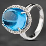 Pre-Owned 14ct White Gold 2.73ct Blue Topaz & 0.29ct Brilliant Cut Diamond Oval Cluster Ring 4345018