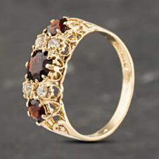 Pre-Owned 9ct Yellow Gold Garnet & Cubic Zirconia Seven Stone Ring 41103198