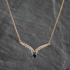 Pre-Owned 9ct Yellow Gold Blue Topaz & Diamond V Shaped Pendant & 17 Inch Herringbone Chain 41142414