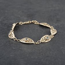 Pre-Owned 9ct Yellow Gold Blue Topaz Celtic Style 7.5 Inch Bracelet 41281328
