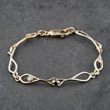 Pre-Owned 9ct Two Colour Gold 0.20ct Brilliant Cut Diamond Fish Link Design 7.5 Inch Chain Bracelet 41281602
