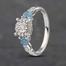 Pre-Owned 9ct White Gold Blue Topaz & 0.15ct Diamond Cluster Ring 41382879