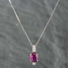 Pre-Owned Platinum Ruby & Brilliant Cut Diamond Oval Pendant & 16-18 Inch Box Chain 43141003