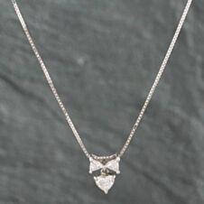 Pre-Owned Platinum 0.62ct Diamond Bow Pendant & 19 Inch Box Chain 43141014