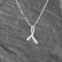 Pre-Owned White Gold Bow Pendant & 18 Inch Curb Chain 41142855