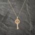 Pre-Owned 9ct Yellow Gold Cubic Zirconia 21 Key Pendant & 18 Inch Curb Chain 41142979