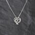 Pre-Owned 9ct White Gold Cubic Zirconia Set Double Heart Pendant & 18 Inch Curb Chain 41143475