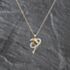 Pre-Owned 9ct Yellow Gold Cubic Zirconia Dolphin Pendant & 16 Inch Curb Chain 41143514